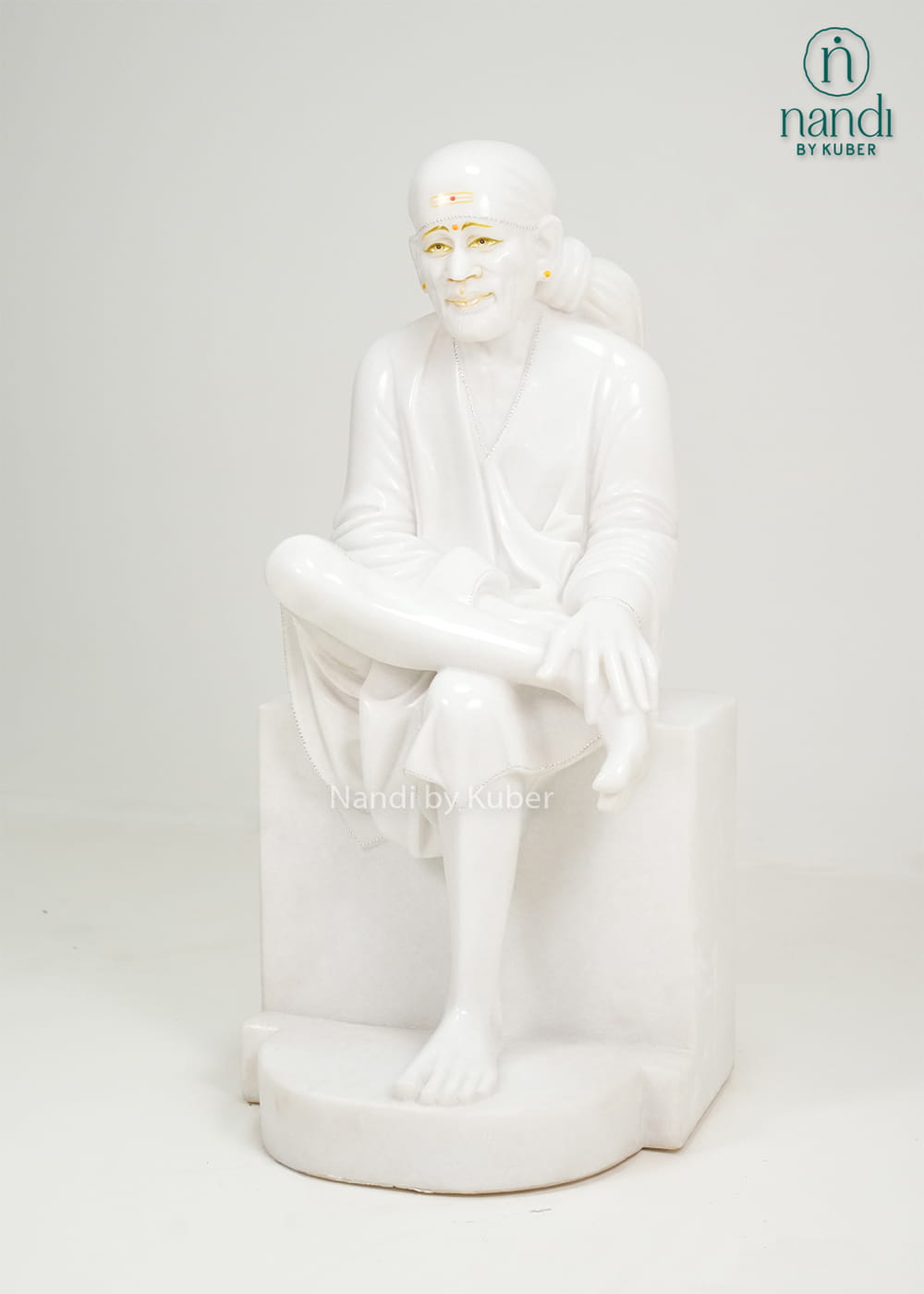 White marble Sai Baba statue  