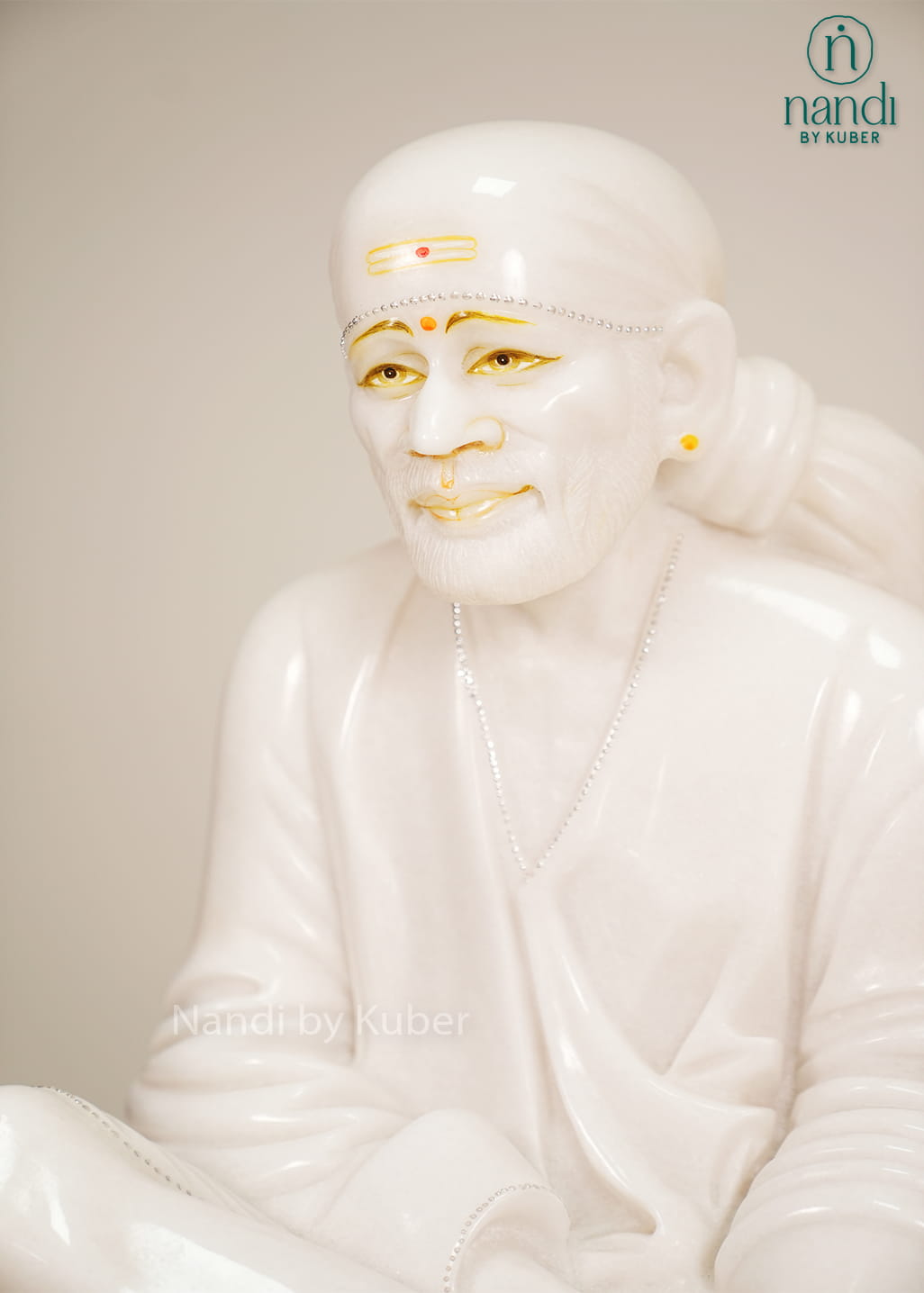 White marble Sai Baba statue 