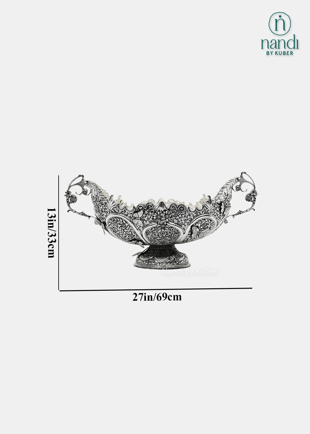 Decorative silver fruit bowl with floral carving and ornate side handles