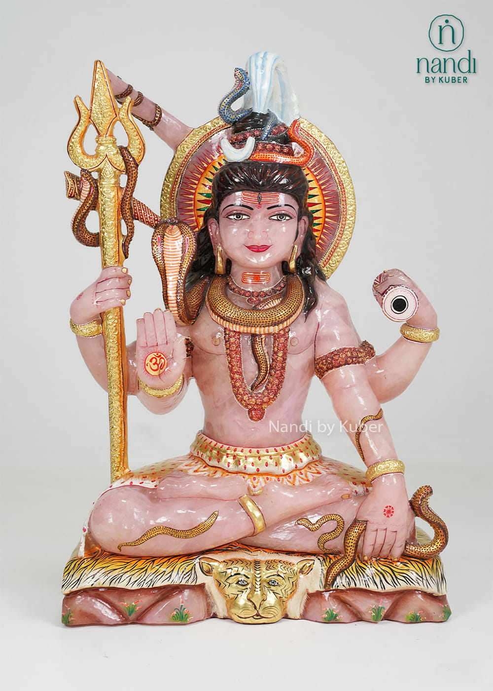 Rose quartz Lord Shiva statue with trident, serpent detailing, and gold accents