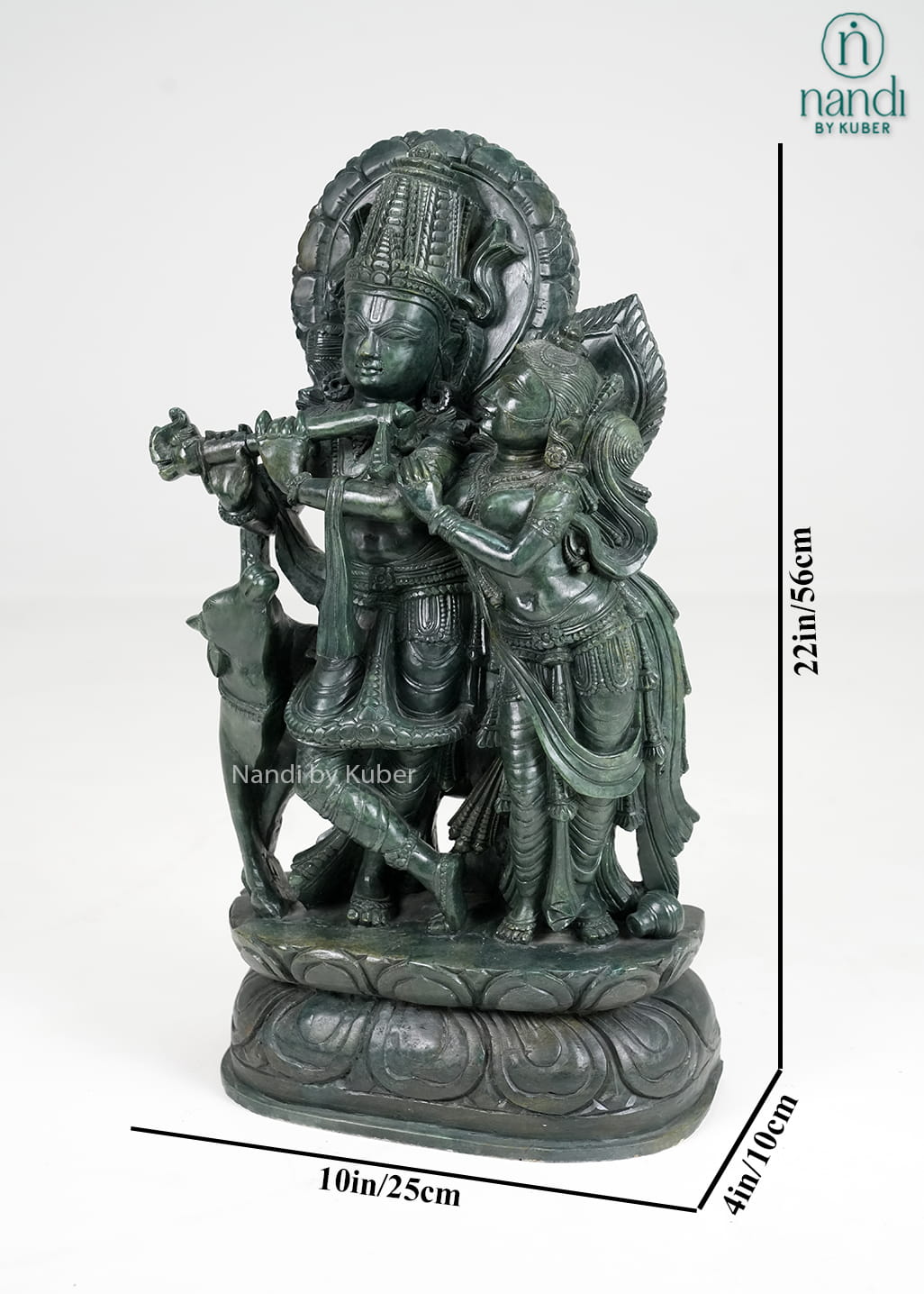Stone Radha Krishna statue with cow and intricate detailing