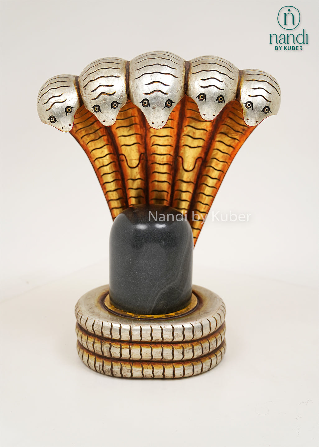 Handcrafted Shivling with five-headed Sheshnag statue, featuring intricate serpent detailing and traditional design, ideal for pooja rooms, spiritual décor, temple settings, and religious gifting.