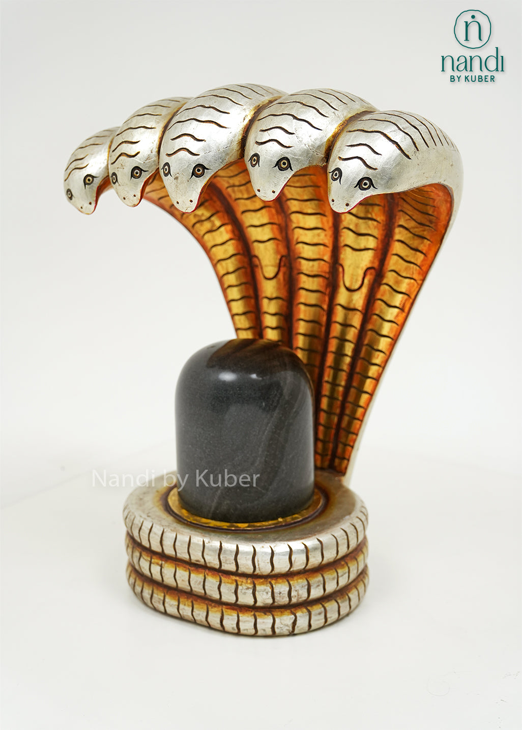 Handcrafted Shivling with five-headed Sheshnag statue, featuring intricate serpent detailing and traditional design, ideal for pooja rooms, spiritual décor, temple settings, and religious gifting.