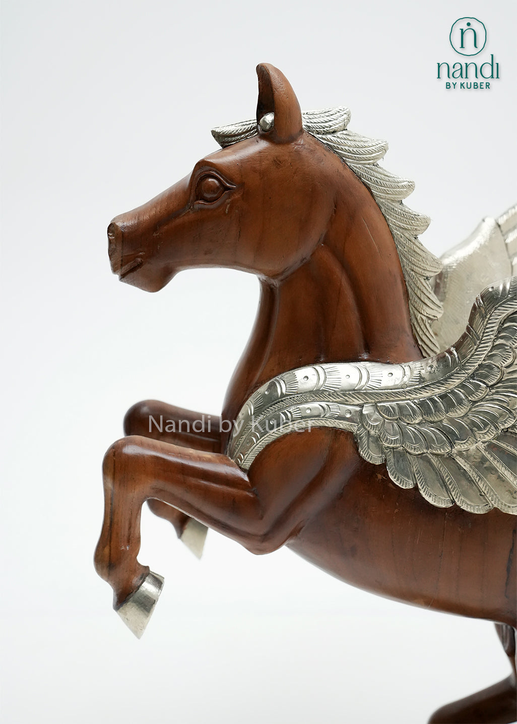 Decorative Pegasus horse statue crafted from wood and metal, showcasing silver wings, elegant detailing, and a cloud-style pedestal, ideal for luxury home décor and collectible displays.