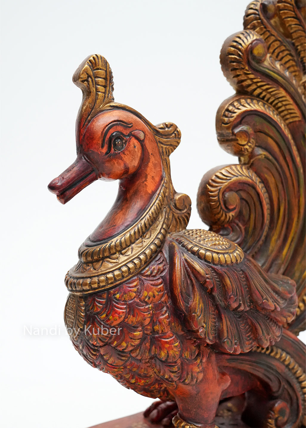 Traditional wooden Annam bird statue with ornate carvings, decorative tail feathers, and carved pedestal base, ideal for home décor, heritage interiors, and artistic display.