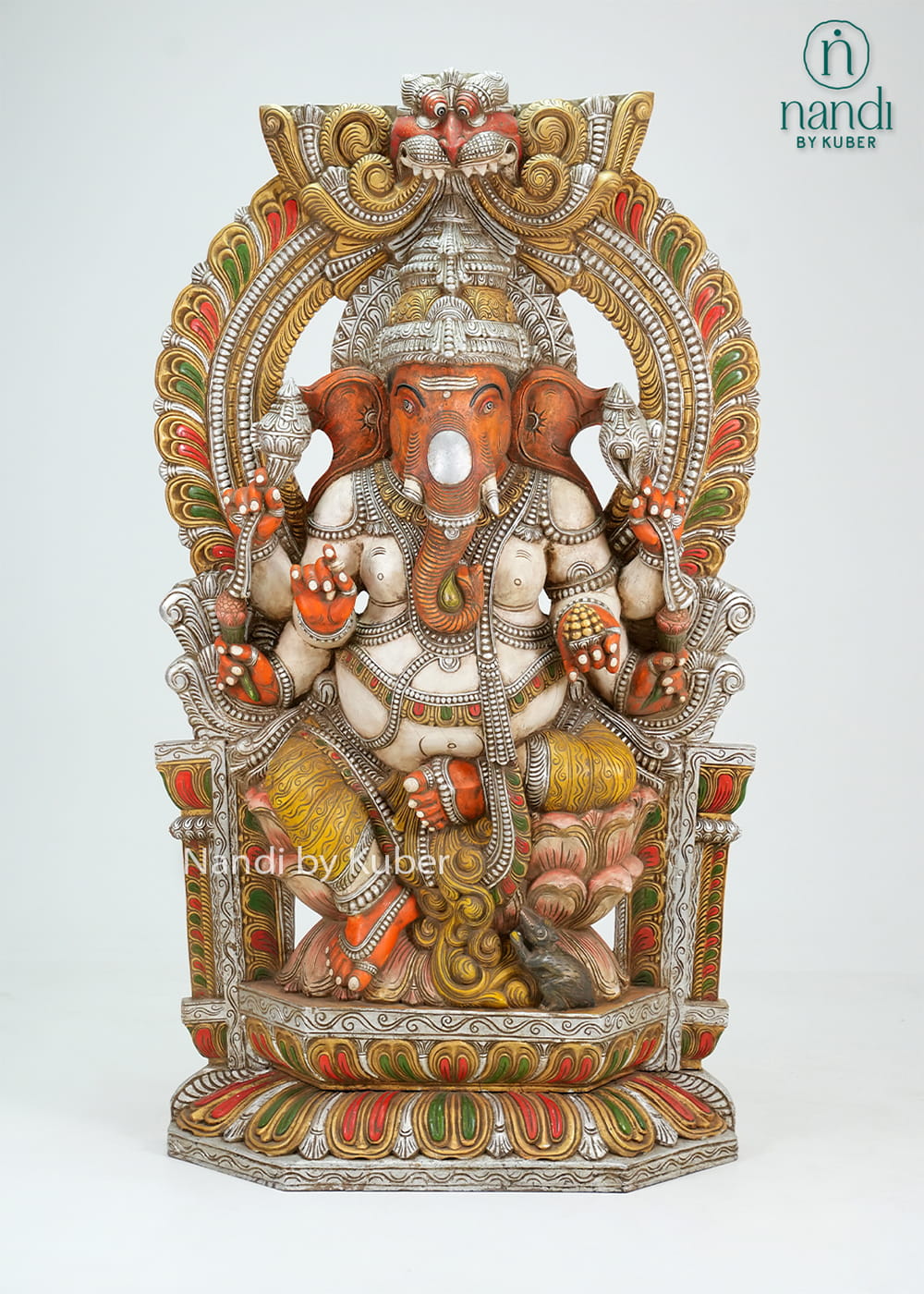 Antique-finish Lord Ganesha statue with ornate arch and throne