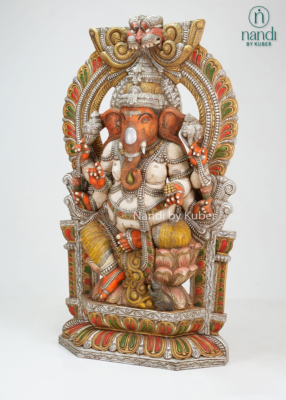 Antique-finish Lord Ganesha statue with ornate arch and throne