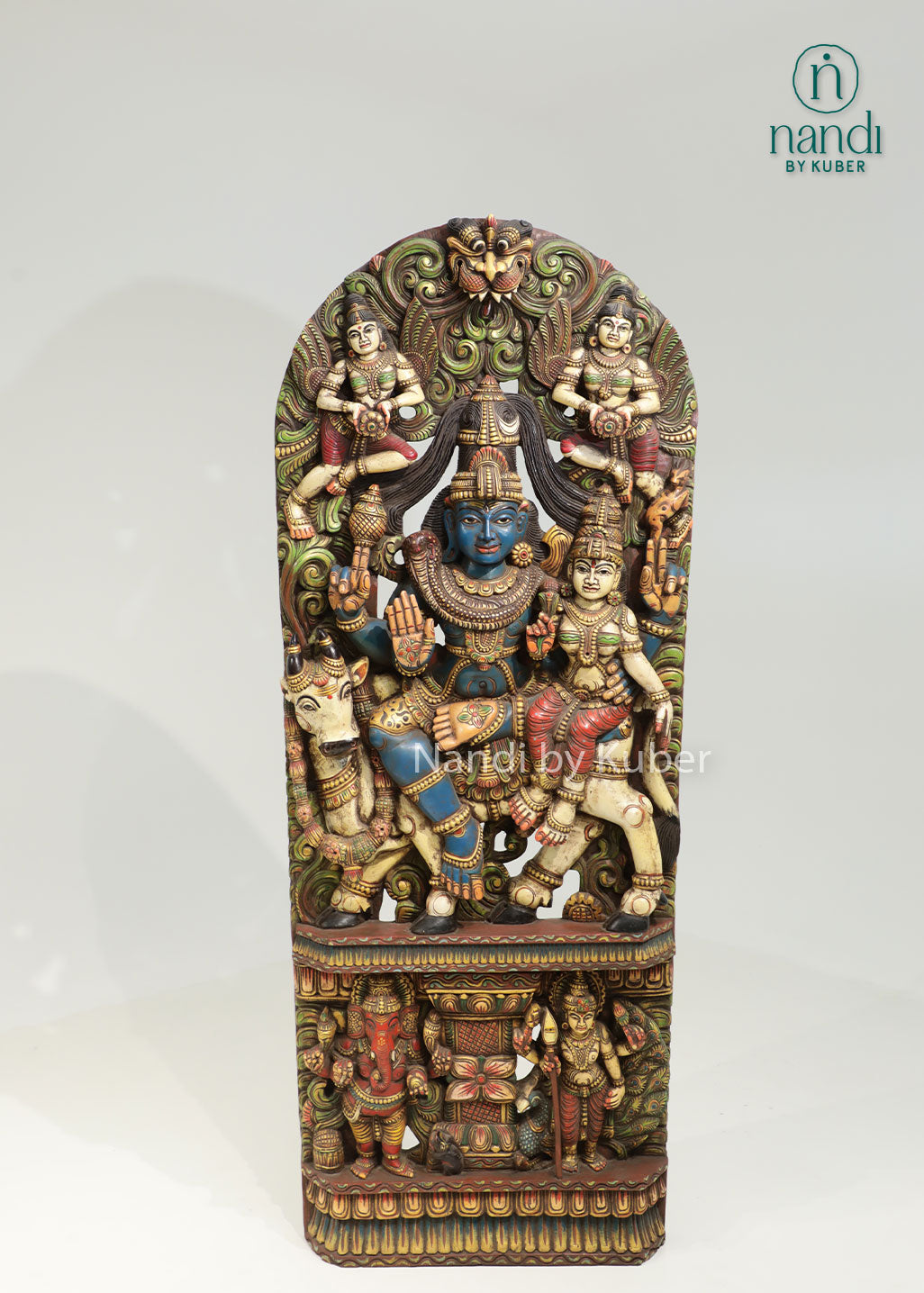Handcrafted wooden wall panel featuring Lord Shiva, Goddess Parvati, and Nandi with intricate carvings and vibrant detailing, perfect for spiritual and decorative spaces.