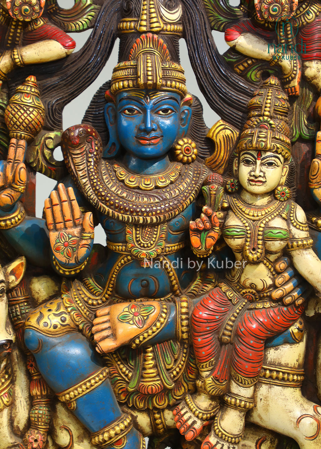 Handcrafted wooden wall panel featuring Lord Shiva, Goddess Parvati, and Nandi with intricate carvings and vibrant detailing, perfect for spiritual and decorative spaces.
