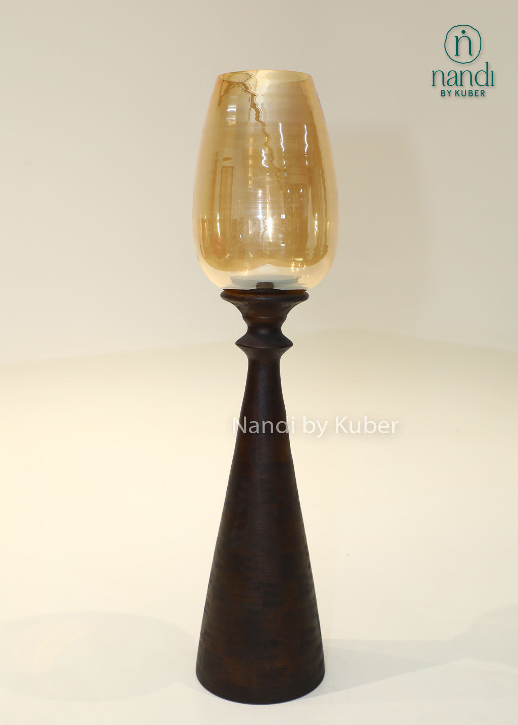 Wooden bottle candle holder with amber glass shade, handcrafted decorative candle stand for home décor, table centerpiece, ambient lighting, festive decoration, rustic interiors, and modern living spaces.