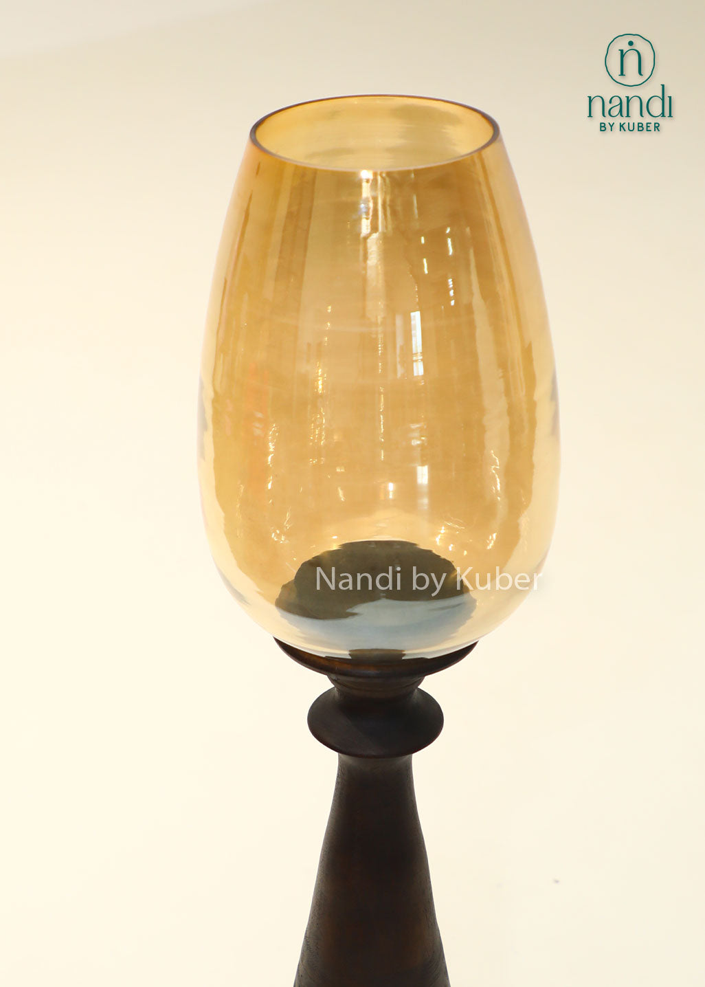 Wooden bottle candle holder with amber glass shade, handcrafted decorative candle stand for home décor, table centerpiece, ambient lighting, festive decoration, rustic interiors, and modern living spaces.