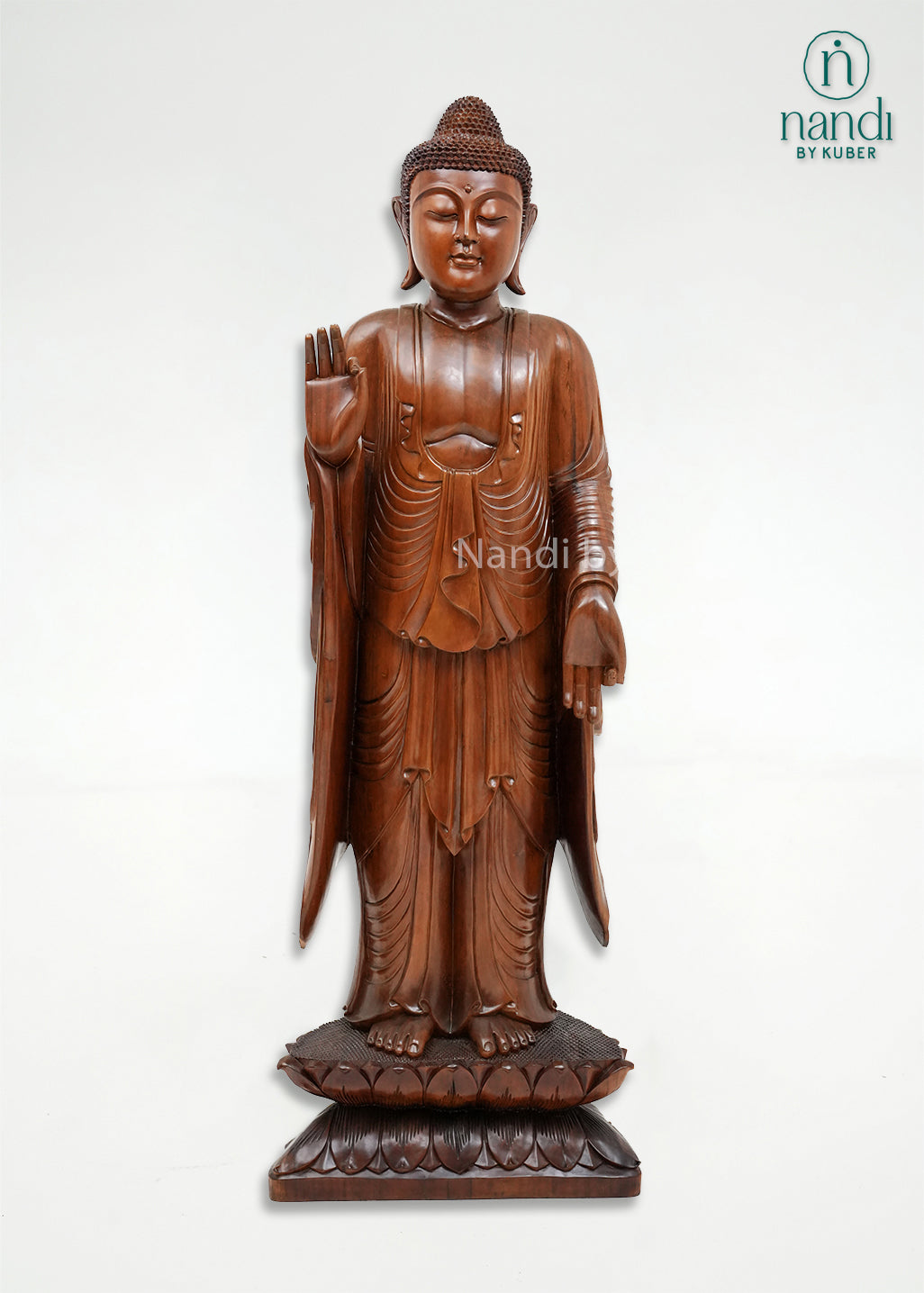 Handcrafted wooden standing Buddha statue with detailed robes, blessing gesture, and lotus base, ideal for meditation spaces, spiritual décor, home interiors, and thoughtful gifting.