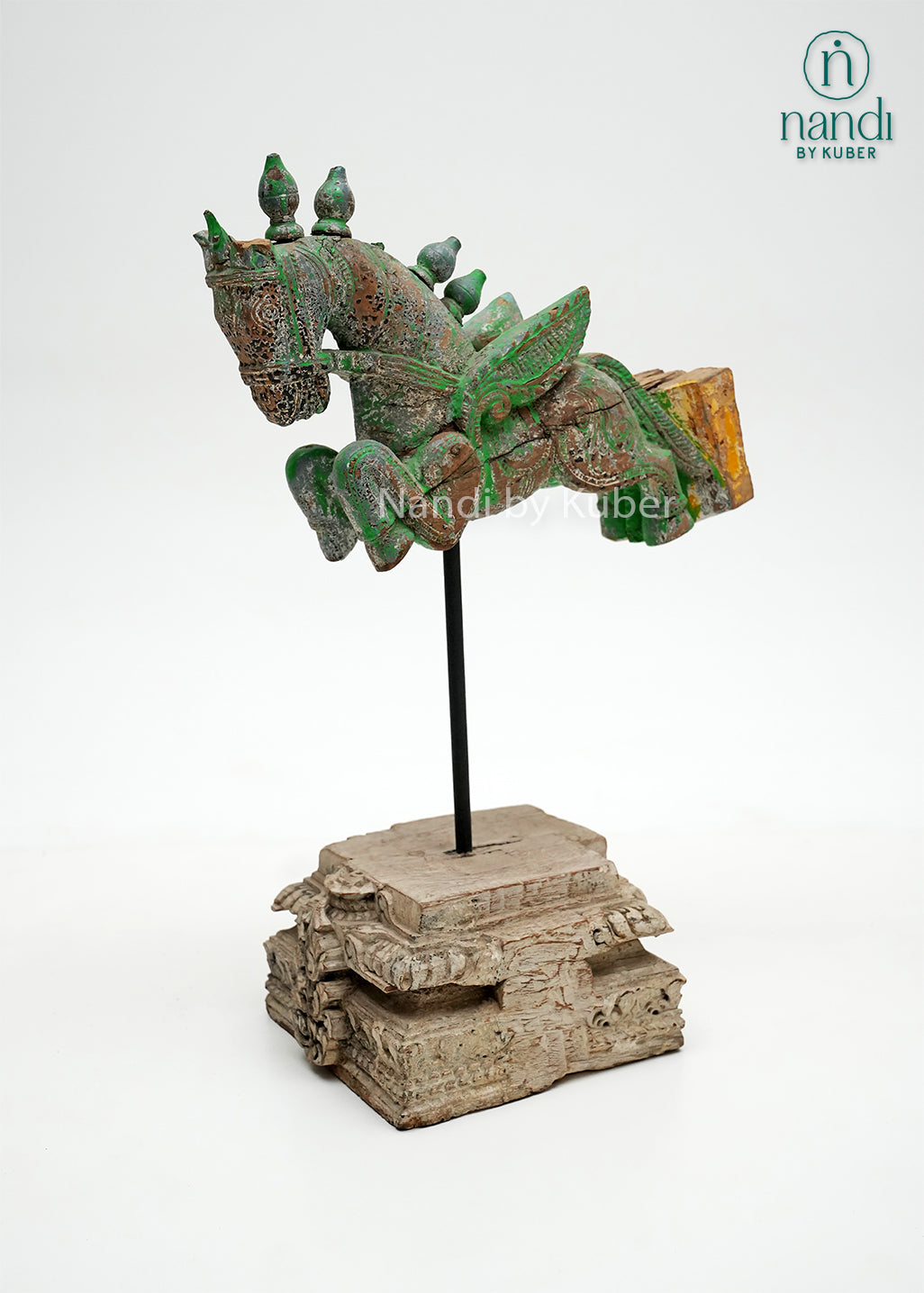 Decorative wooden horse figurine with vintage green finish, mounted on an iron stand and reclaimed wood base, ideal for rustic, bohemian, and heritage-inspired home décor.