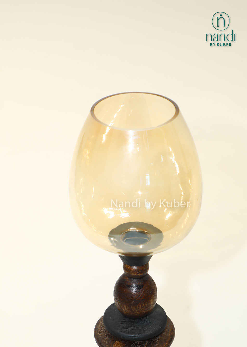 Handcrafted wooden hurricane candle holder with amber glass shade, decorative tabletop lantern, rustic home décor accent, elegant candle stand for living room, dining table, and festive decoration.