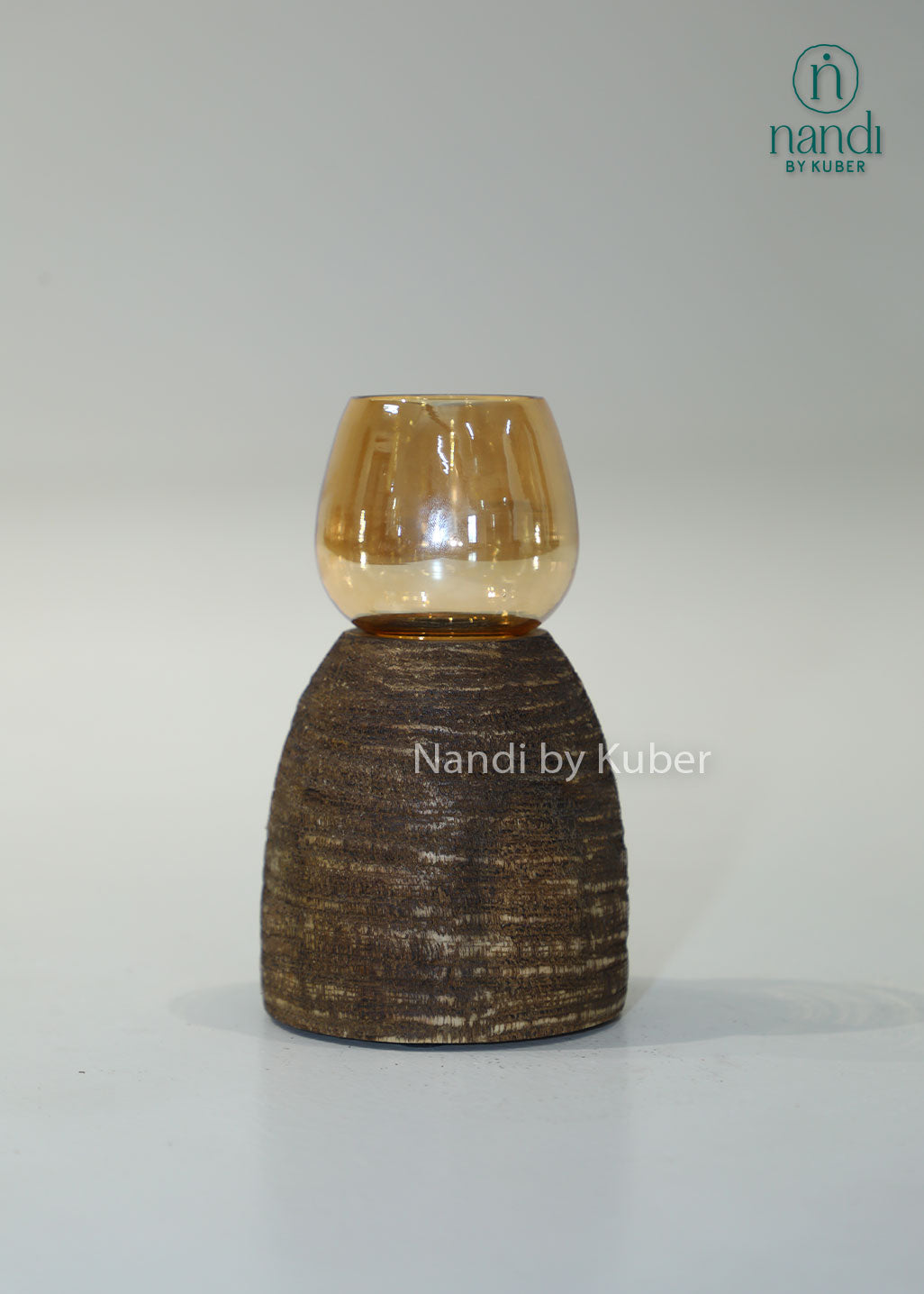 Wooden igloo candle holder with amber glass shade, handcrafted decorative candle stand for home décor, table centerpiece, ambient lighting, festive decoration, rustic styling, and modern interior accents.