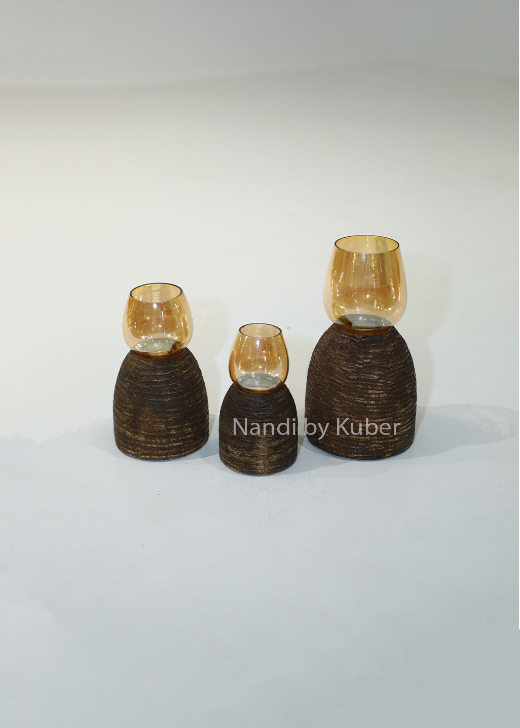 Wooden igloo candle holder with amber glass shade, handcrafted decorative candle stand for home décor, table centerpiece, ambient lighting, festive decoration, rustic styling, and modern interior accents.