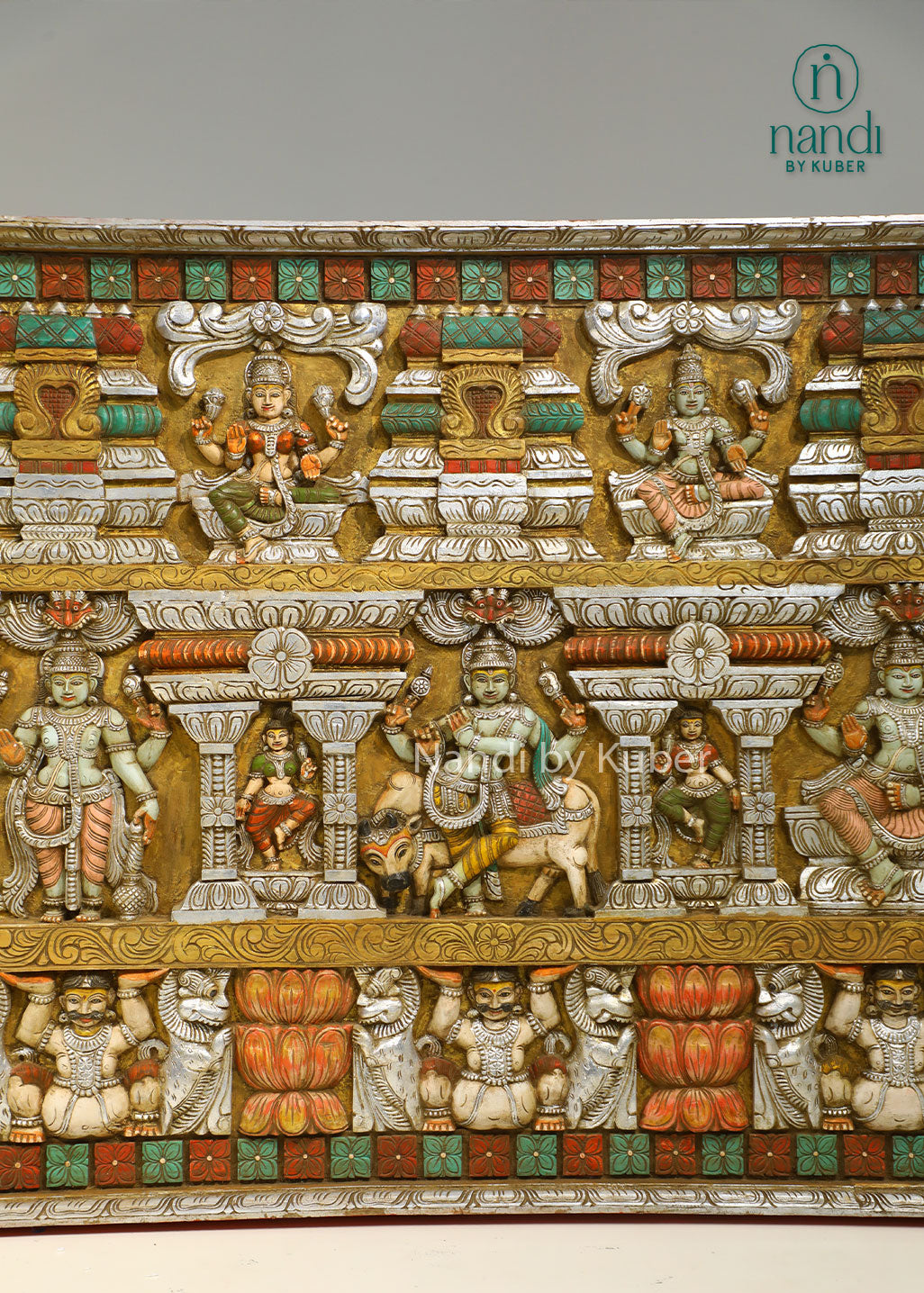 Handcrafted wooden wall panel with intricate Krishna-inspired carvings and hand-painted detailing, perfect for adding traditional elegance and cultural charm to any space.