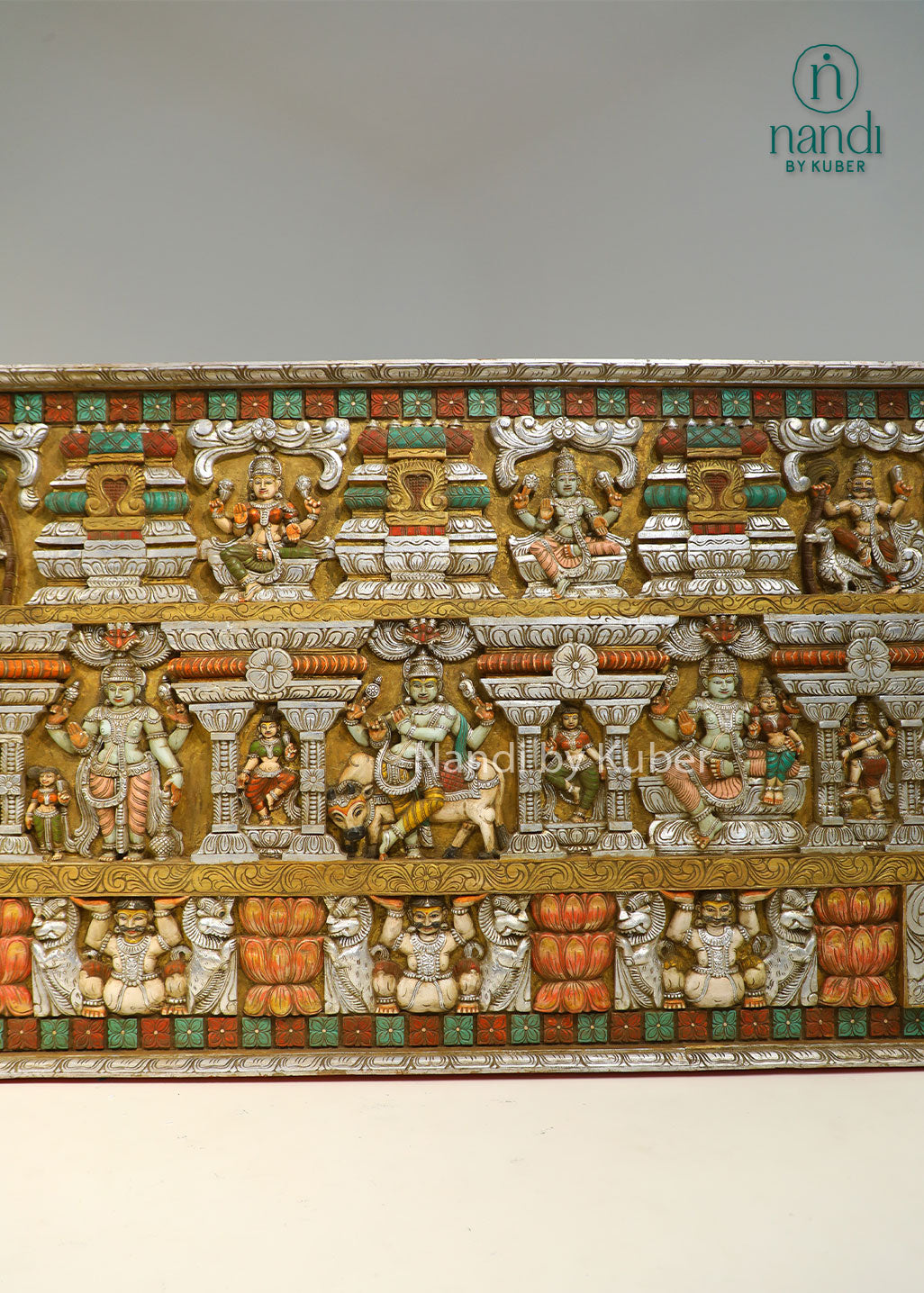 Handcrafted wooden wall panel with intricate Krishna-inspired carvings and hand-painted detailing, perfect for adding traditional elegance and cultural charm to any space.