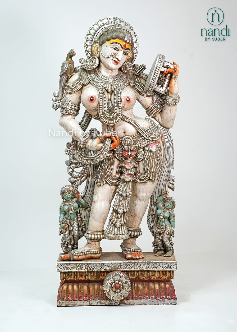 Decorative lady statue with mirror and traditional handcrafted detailing