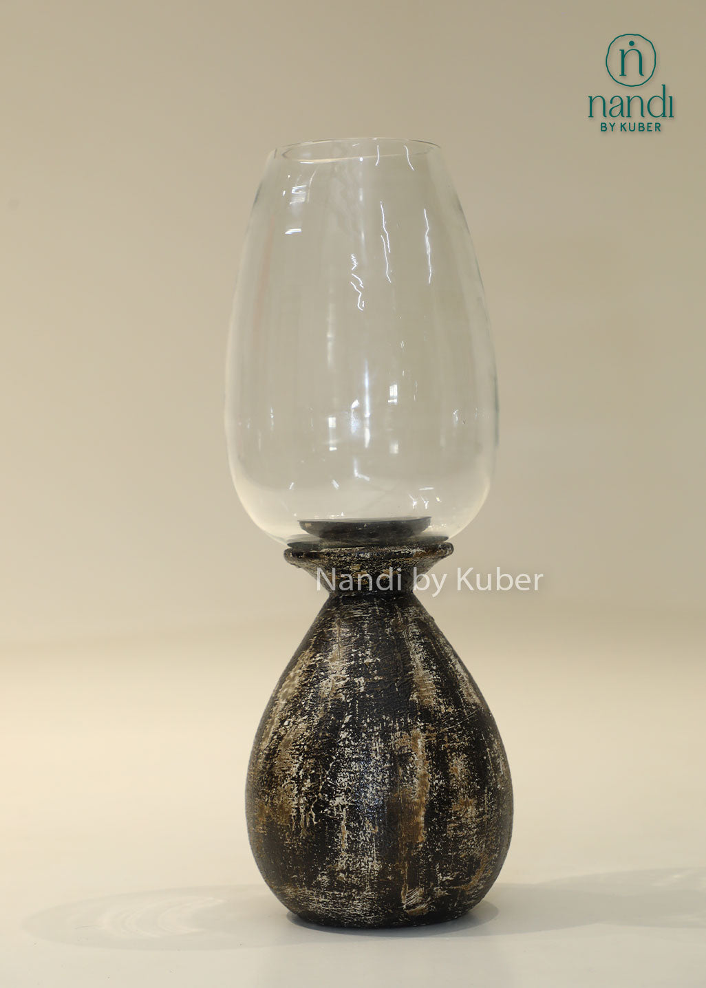 Wooden long matka candle holder with clear glass shade, handcrafted decorative candle stand for home décor, table centerpiece, ambient lighting, festive decoration, and modern rustic interiors.