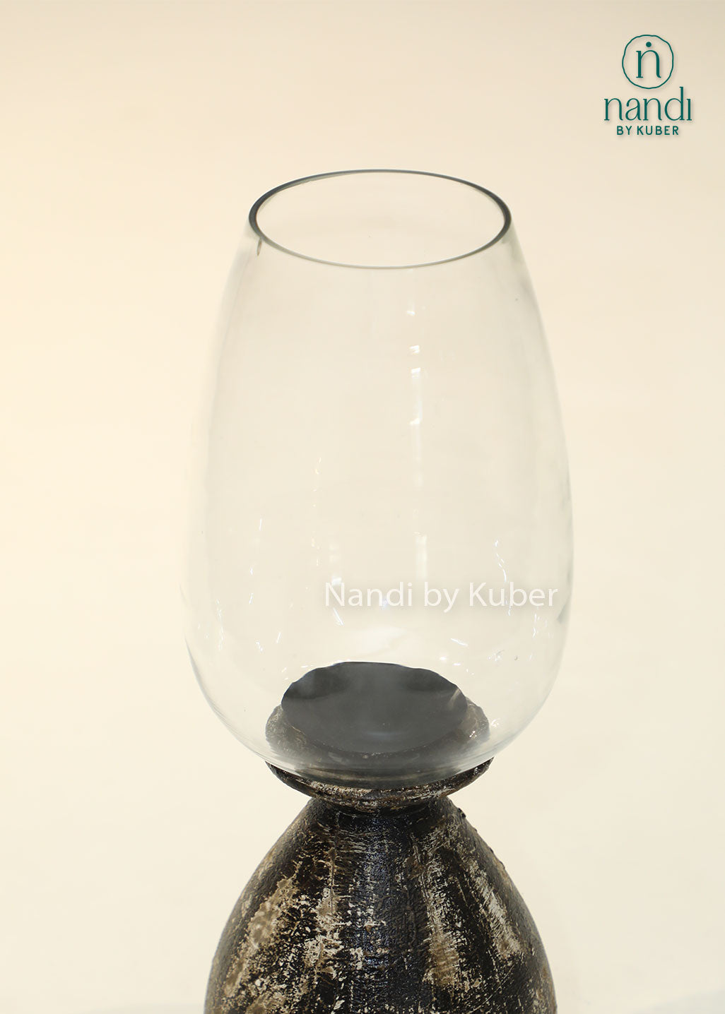 Wooden long matka candle holder with clear glass shade, handcrafted decorative candle stand for home décor, table centerpiece, ambient lighting, festive decoration, and modern rustic interiors.