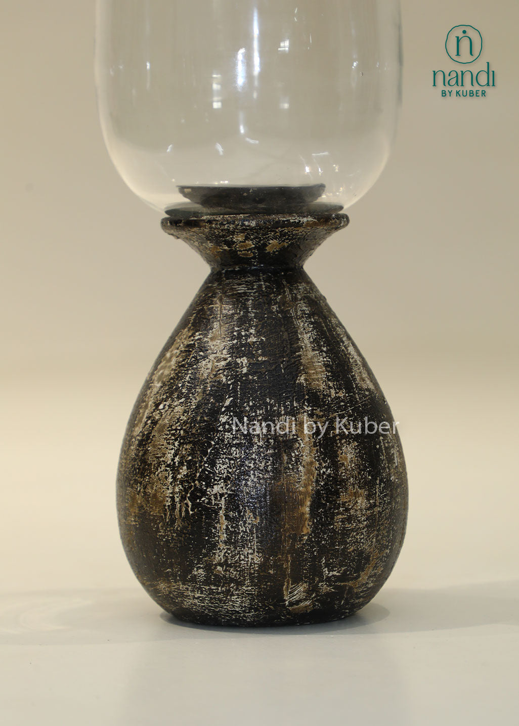 Wooden long matka candle holder with clear glass shade, handcrafted decorative candle stand for home décor, table centerpiece, ambient lighting, festive decoration, and modern rustic interiors.