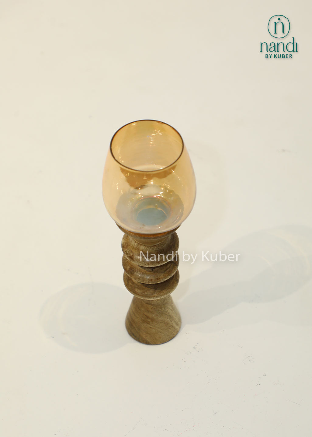 Wooden candle holder with amber glass hurricane shade, decorative candle stand for home décor, living room, dining table centerpiece, festive decoration, rustic styling, ambient lighting, and elegant gifting.