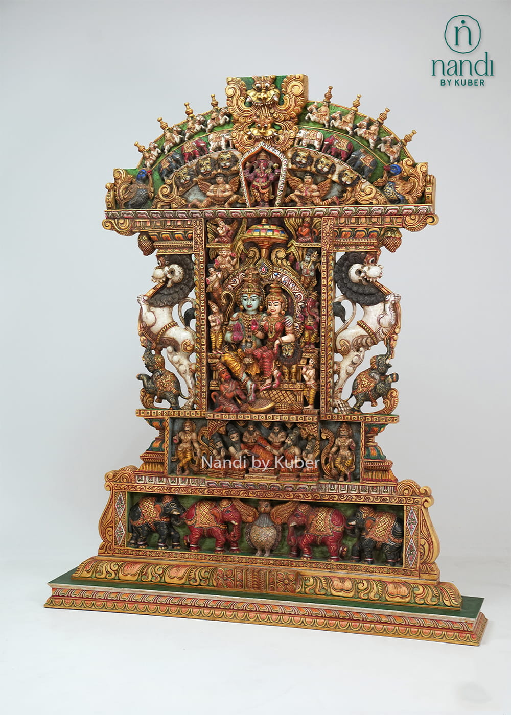 Handcrafted wooden Ram Darbar shrine with ornate temple arch, detailed carvings, vibrant colors, and traditional devotional artwork.