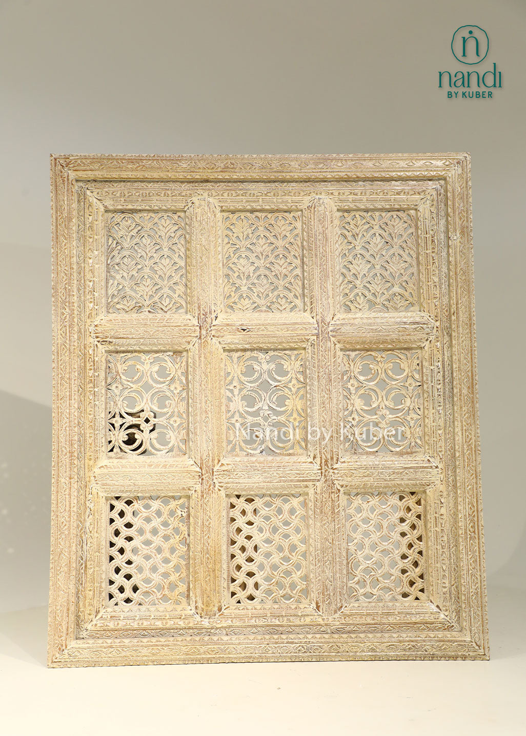 Hand-carved wooden wall décor panel with intricate detailing and antique finish, bringing timeless elegance and artisanal charm to any space.