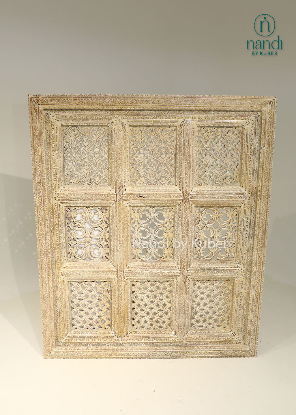 Hand-carved wooden wall décor panel with intricate detailing and antique finish, bringing timeless elegance and artisanal charm to any space.