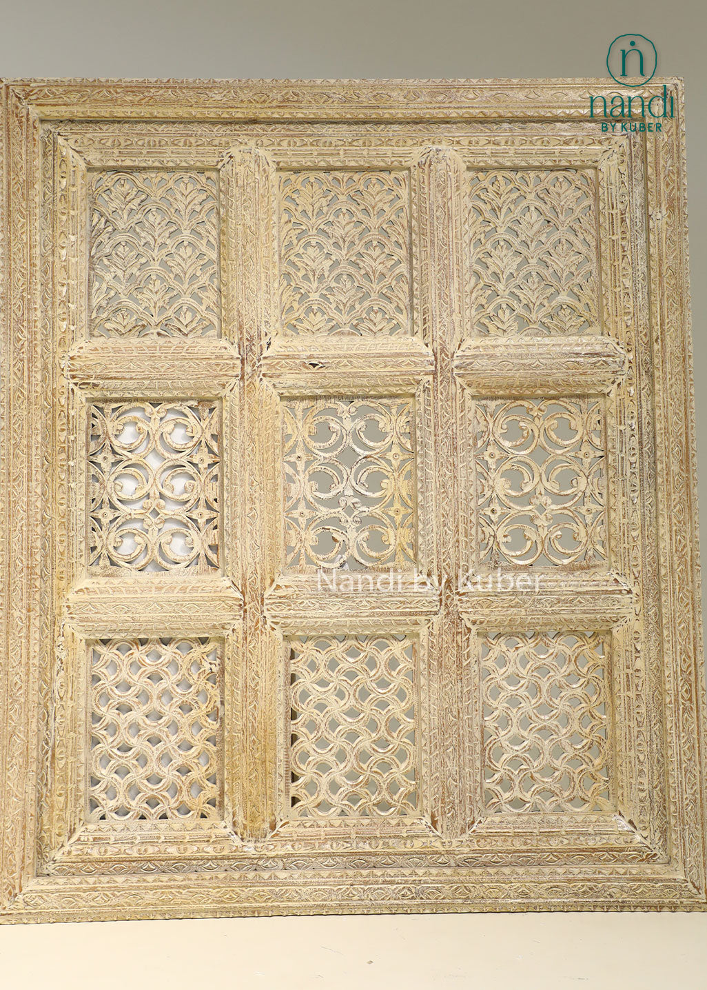 Hand-carved wooden wall décor panel with intricate detailing and antique finish, bringing timeless elegance and artisanal charm to any space.